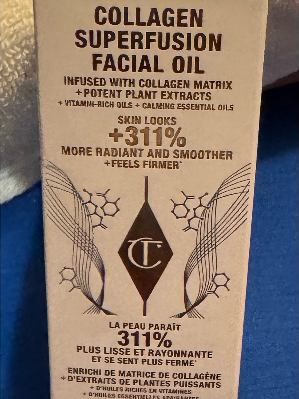 Charlotte Tilbury Collagen Superfusion Facial Oil – Beige and Gold Text